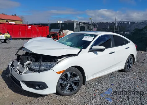 2018 Honda Civic Touring from USA, damaged, VIN JHMFC1F97JX012327